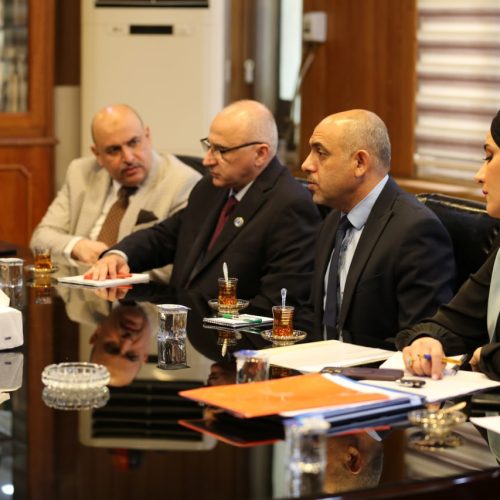 The President of the University of Baghdad and the Dean of the College of Languages are Discussing Opening the Chinese Language Department at the College of Languages11